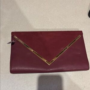 Aldo Red and Gold Clutch with Elegant Geometric Design